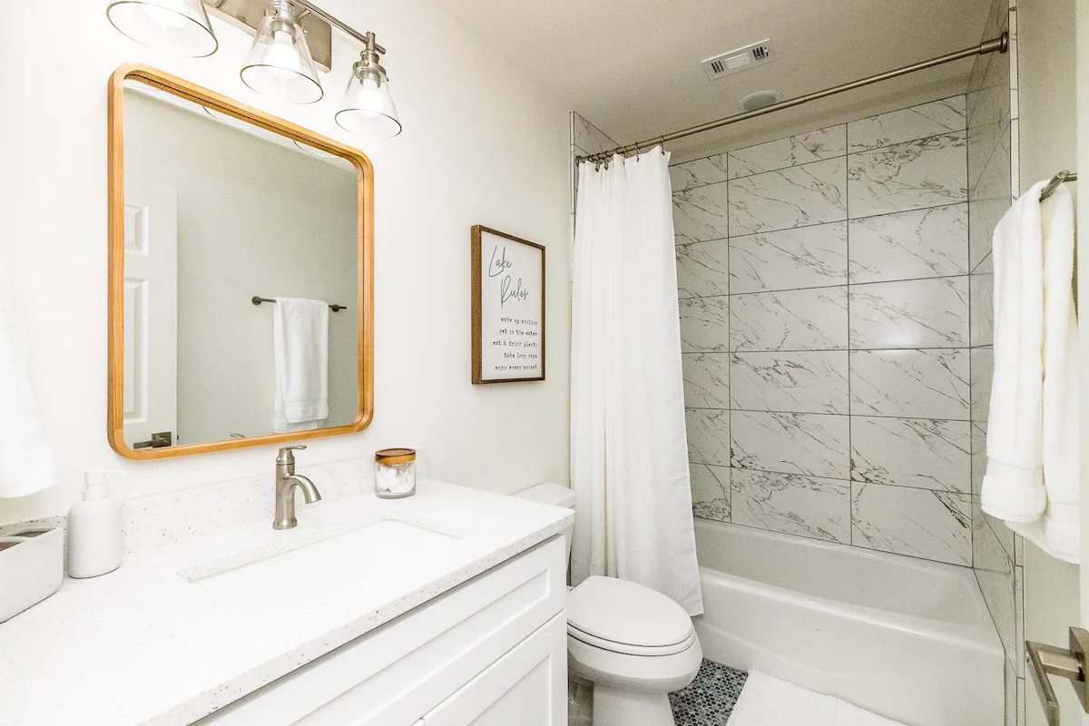 Sandy Shores Sanctuary bathroom with tub and shower