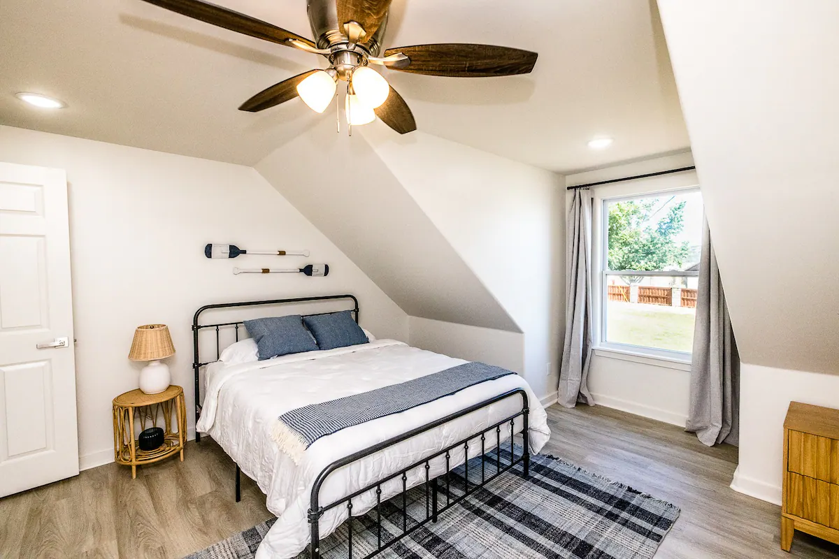Sandy Shores Sanctuary bedroom with backyard view