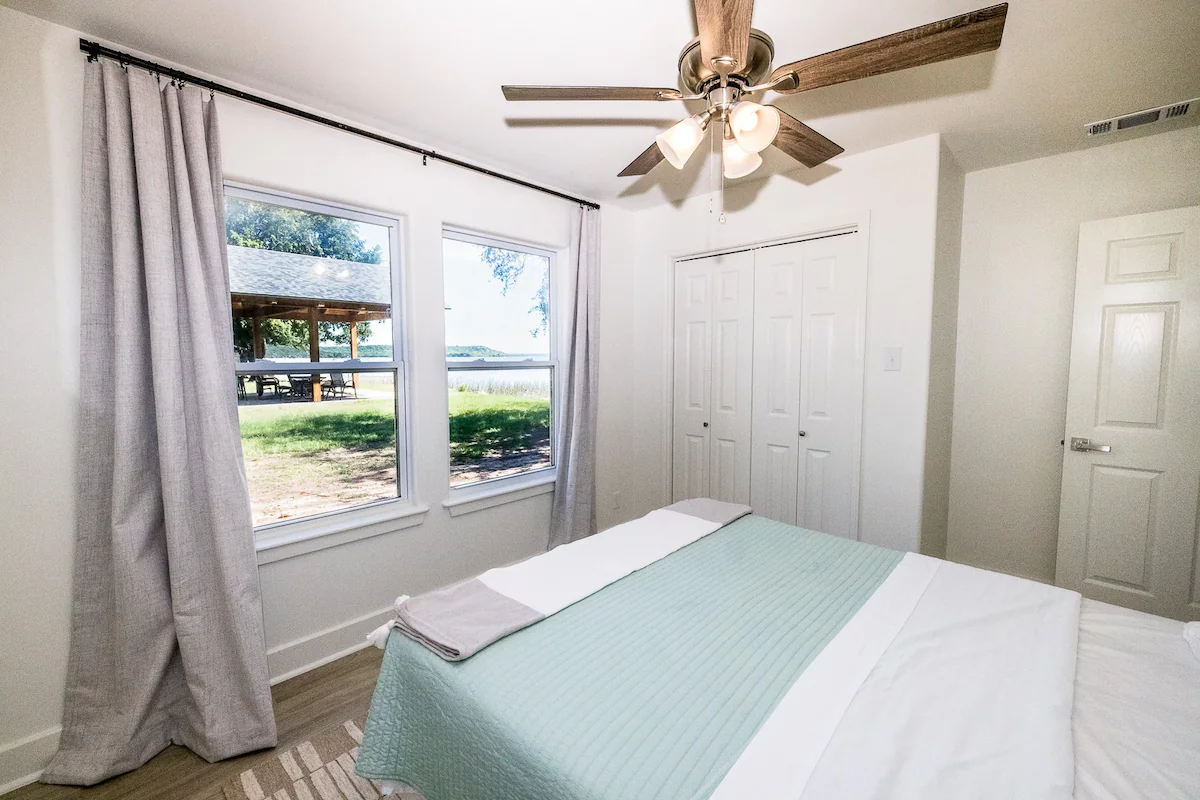 Sandy Shores Sanctuary bedroom with lake view
