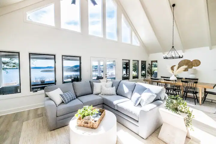 Sandy Shores Sanctuary living room with huge sectional couch and vaulted ceilings