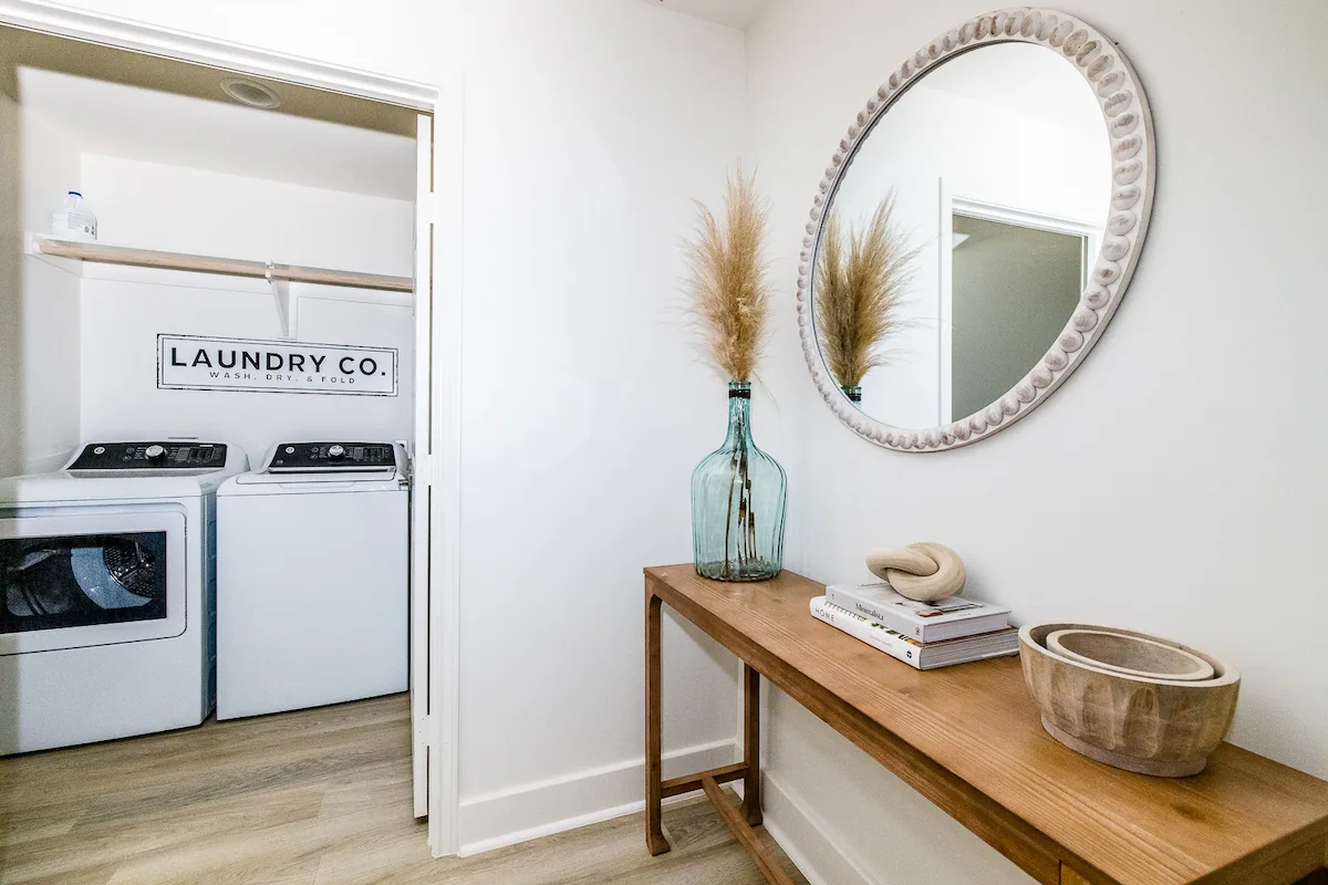 Sandy Shores Sanctuary laundry room with full size washer and dryer