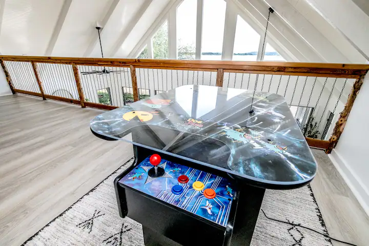 Sandy Shores Sanctuary upstairs loft with pacman arcade game
